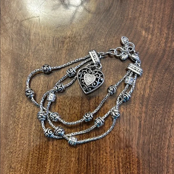 Brighton Reno Heart Bracelet features a silver-plated triple chain design, EUC - Picture 7 of 8